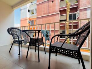 Outdoor balcony with chairs and table