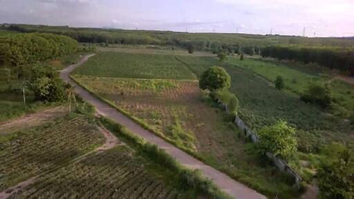 Aerial view of a vast plot of land with greenery