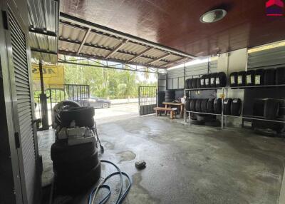 Garage with tire storage and work area