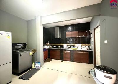 Modern kitchen with dark backsplash