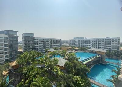 Overview of resort with multiple pools and surrounding buildings