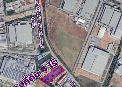 Aerial view of an industrial area featuring labeled land plot