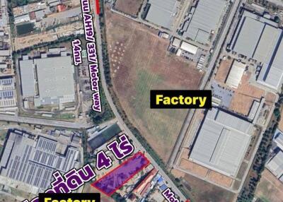 Aerial view of industrial area with factories and surrounding roads