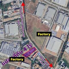 Aerial view of industrial area with factories and surrounding roads