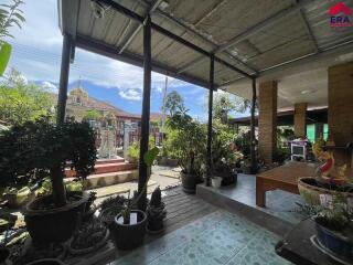 Outdoor covered patio with garden view