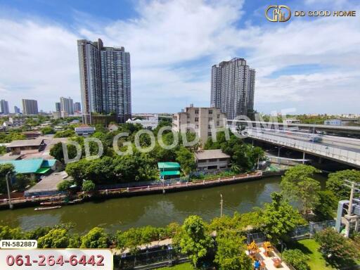 Aerial view of urban landscape with buildings and waterway