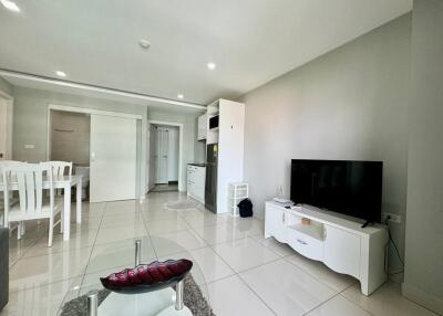 Modern living room with dining area and kitchen