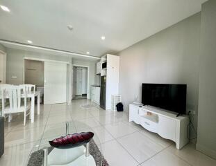 Modern living room with dining area and kitchen