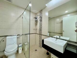 Modern bathroom with a glass-enclosed shower