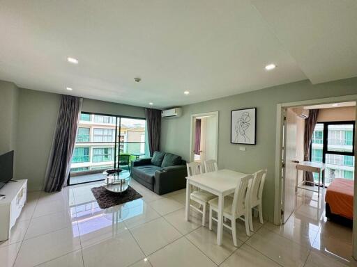 Modern living room with adjoining dining area