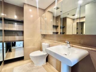 Modern bathroom with large mirrors and fixtures