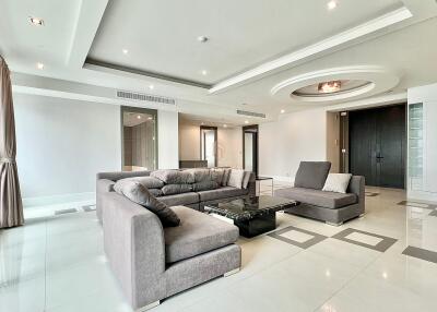 spacious modern living room with large sectional sofa