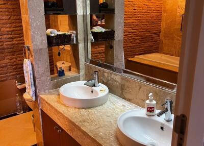 Modern bathroom with double sink and large mirror