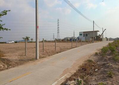 view of property plot with distant house