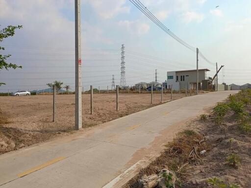 view of property plot with distant house