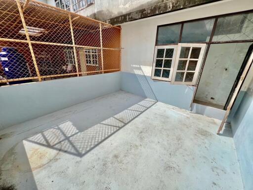Spacious balcony area with protective fencing