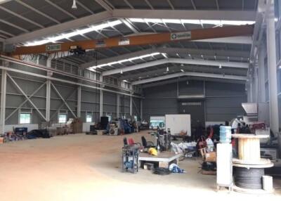 Spacious warehouse with equipment and storage