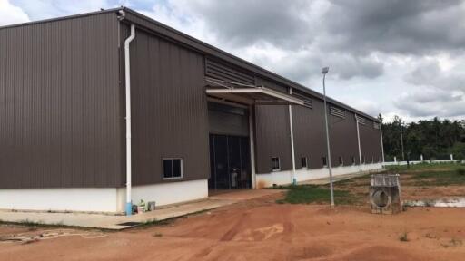 Exterior view of a large industrial warehouse building