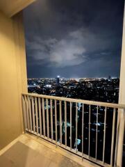 Balcony with a night view of the city landscape