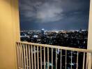 Balcony with a night view of the city landscape