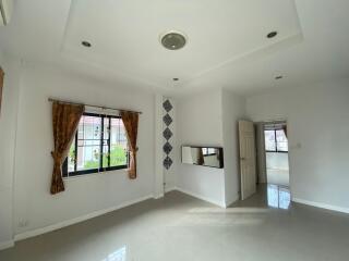 Spacious living room with natural lighting and modern design