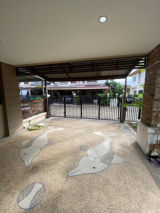 Covered garage with decorative flooring