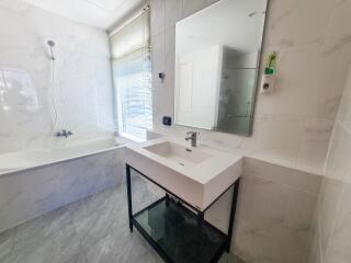 Modern bathroom with bathtub and sink