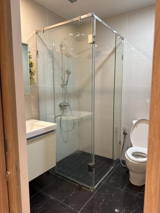 Modern bathroom with glass shower enclosure