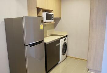 Modern kitchen area with appliances