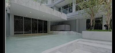 Outdoor swimming pool in modern residential building