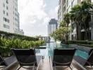 Luxurious outdoor pool area with lounge chairs