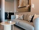 Modern living room with gray sofa and stylish decor