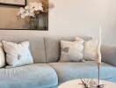 Comfortable modern living room with a grey sofa and decorative cushions