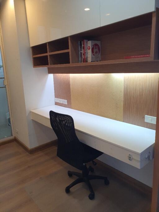 Modern study area with built-in desk and shelving