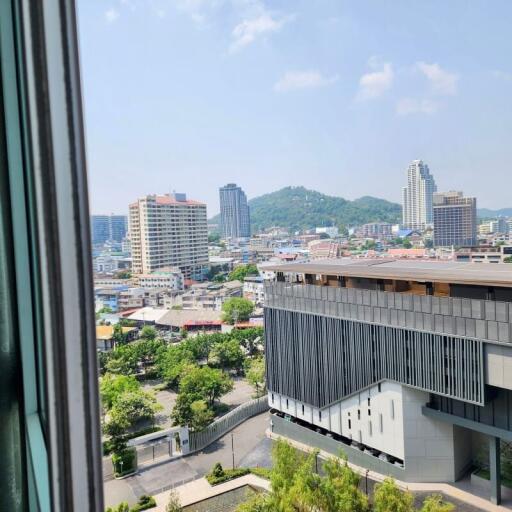 View of cityscape from a high rise building window