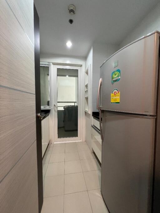 Modern kitchen with refrigerator and countertop