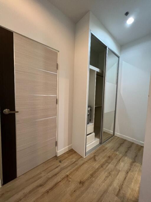 Modern hallway with wooden flooring