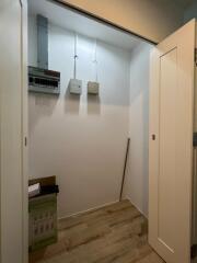 Utility room with electrical panel and boxes