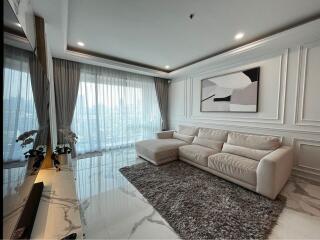 Elegant modern living room with large windows