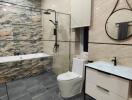 Modern bathroom with bathtub, shower, toilet, and sink