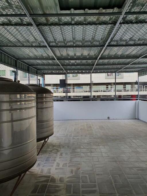 Rooftop with water storage tanks