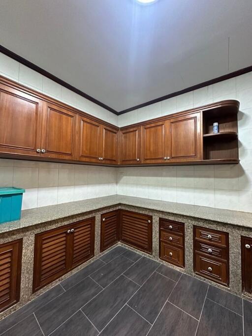 kitchen with wooden cabinets and granite countertops