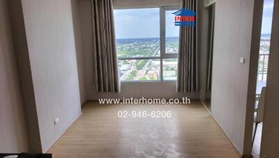 Empty bedroom with large window and curtain, wooden floor