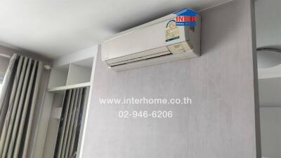 Bedroom with air conditioning unit