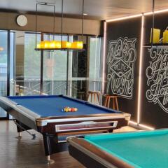 Modern recreational room with pool tables