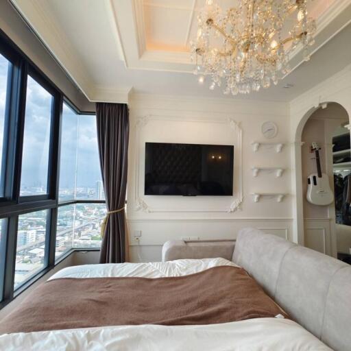 Luxurious bedroom with a stunning city view