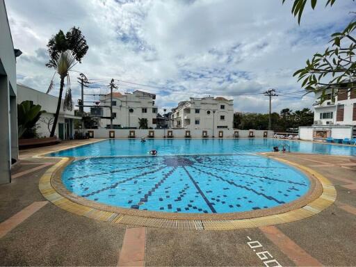 Outdoor pool area with spacious swimming pool