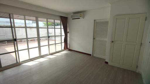 Bright main living space with sliding glass doors