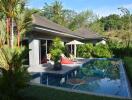 Villa with swimming pool in tropical setting