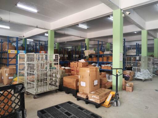 Warehouse area with shelving and boxes